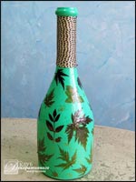 Бутылка с декором из засушенных листьев